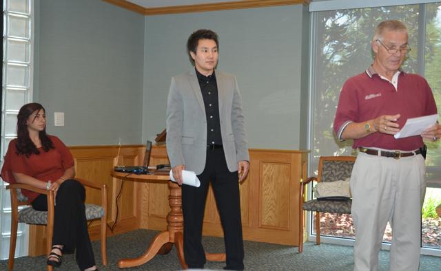 Marion Hall, left, director of special projects at Campbellsville University, introduces interns Khulan Ganbold of Mongolia and Luisa Crespo Martini of Venezuela, who presented their projects to the building and grounds committee of CU’s Board of Trustees. (Campbellsville University Photo by Joan C. McKinney)