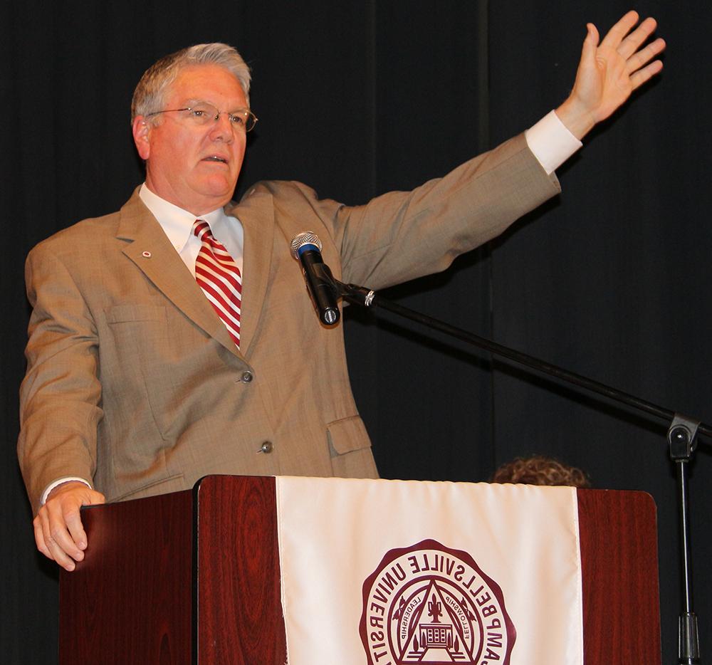 Dr. Keith Spears, vice president for graduate and  professional studies, tells the students they accepted  the challenge of becoming a Christian servant leader.