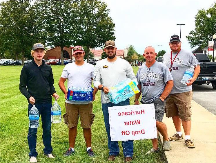 Members of the CU Bass Fishing Team are receiving bottled water to be sent to the Hurricane Harvey and Irma impact areas. (From left, Travis Hunt, Pete Hedgepath (bass fishing Heath coach ), Adam Carman, Levi Neathery, Tray Hardwick)