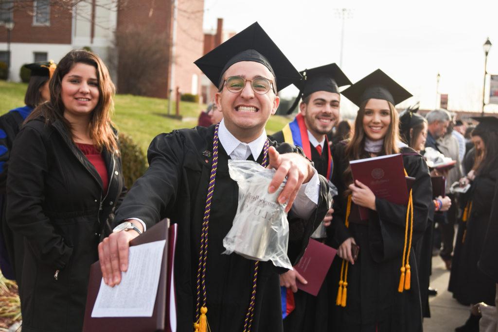 Diego Cardenas of Venezuela expresses his happiness after his graduation ceremony at Campbellsville University. (Campbellsville University Photo by Joshua Williams)